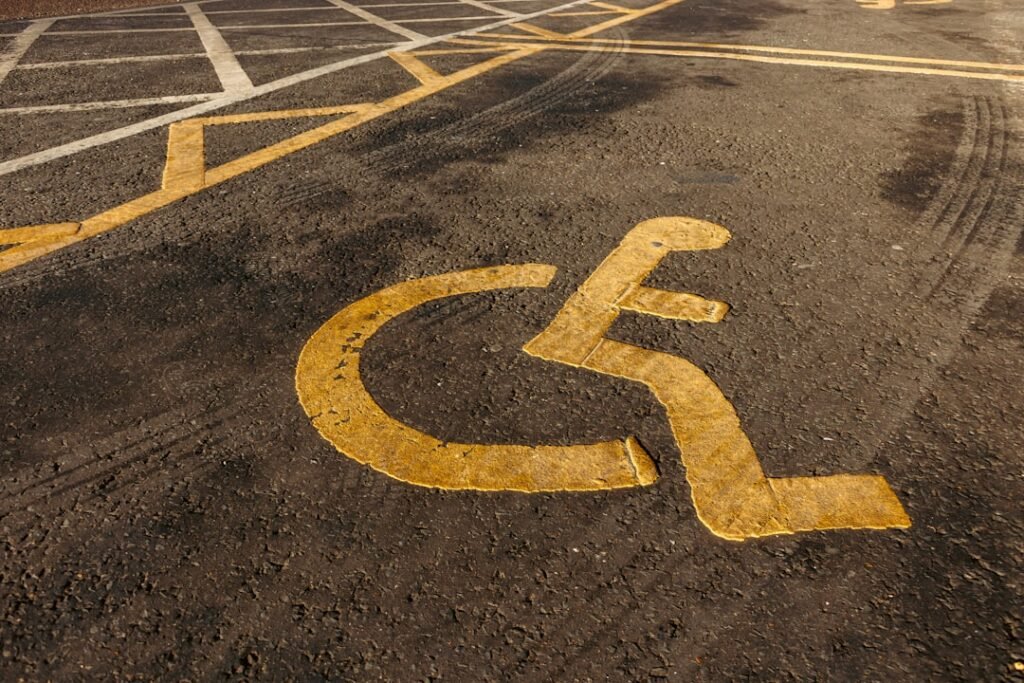 a handicapped sign painted on a parking lot - allied health services aged care sydney in Sydney